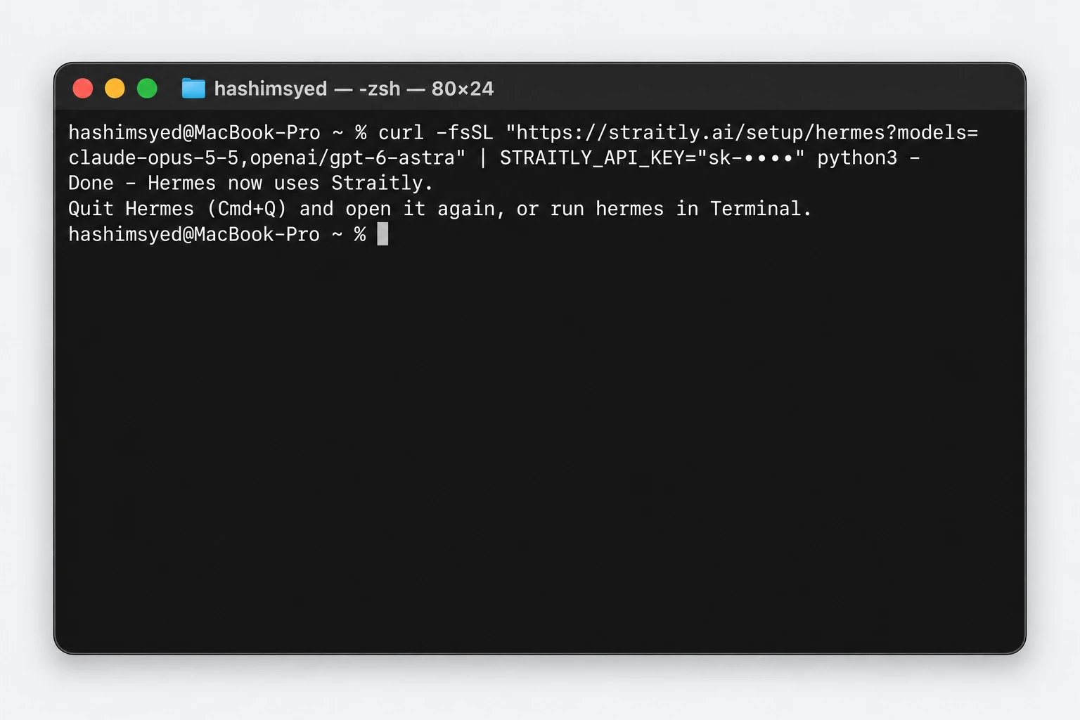 Terminal after pasting the command, showing Done - Hermes now uses Straitly